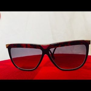 Vintage Marcolin sunglasses. Black with red brow